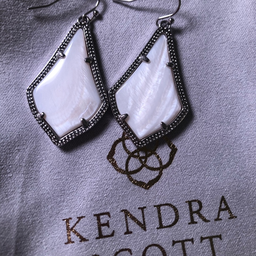 Kendra Scott white stone dangle earrings